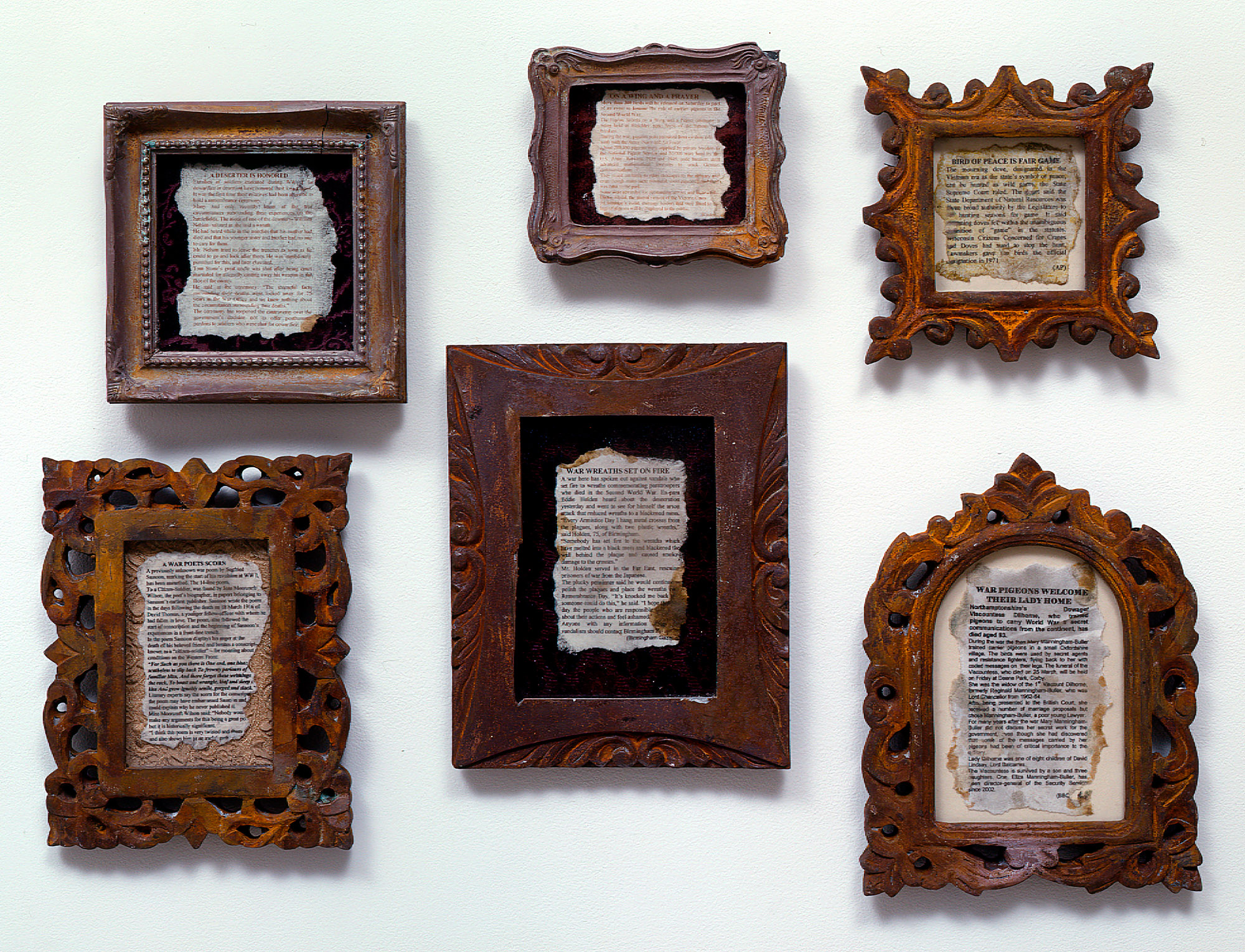 Dario Robleto
One work with 6 elements; titles below are clockwise from top left:

"A Deserter Is Honored"
Homemade paper (cotton infused with blood root, rosewater, bugleweed), melted bullet lead, cold cast nickel and silver, brass, rust, polyester resin, bone glue, typeset
6" x 6" x 1"
2004

"On A Wing And A Prayer"
Homemade paper (cotton infused with sundew, dandelion, pigeon bone dust), melted bullet lead, cold cast nickel and silver, rust, polyester resin, bone glue, typeset
5" x 5" x 1"
2004

"Bird Of Peace Is Fair Game"
Homemade paper (cotton infused with white chestnut, dove bone dust, meadowsweet), melted bullet lead, cold cast nickel and silver, rust, polyester resin, bone glue, typeset
7" x 7" x 1"
2004

"War Pigeons Welcome Their Lady Home"
Homemade paper (cotton infused with sweet balsam, pigeon bone dust, bone dust 
from every bone in the body), melted bullet lead, cold cast nickel and silver, rust, polyester resin, bone glue, typeset 
8" x 9" x 1"
2004

"War Wreaths Set On Fire"
Homemade paper (cotton infused with ground laurel leaves, chrysanthemum ashes, 
tincture of poppy, Blessed Thistle), melted bullet lead, cold cast nickel and silver, brass, rust, polyester resin, bone glue, typeset
8" x 9" x 1"
2004

"A War Poets’ Scorn"
Homemade paper (pulp made from a war poem a Civil War soldier wrote while recovering in the hospital, cotton infused with bugleweed, artillery plant pollen, shrapnel shavings), melted bullet lead, cold cast nickel and silver, rust, polyester resin, bone glue, typeset
7" x 9" x 1"
2004
