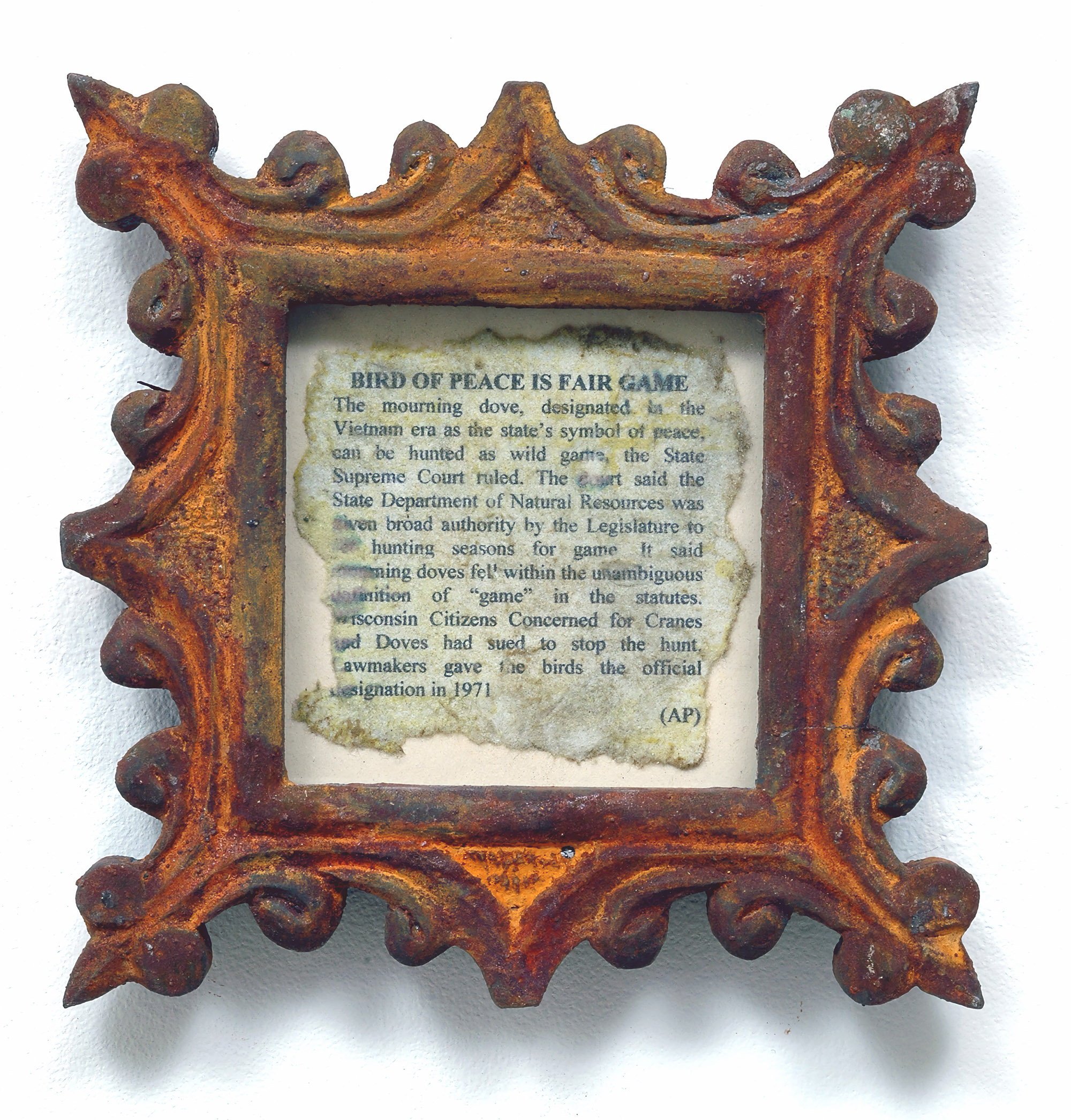 Dario Robleto
"Bird Of Peace Is Fair Game", 2004
Homemade paper (cotton infused with white chestnut, dove bone dust, meadowsweet), melted bullet lead, cold cast nickel and silver, rust, polyester resin, bone glue, typeset
7" x 7" x 1"
